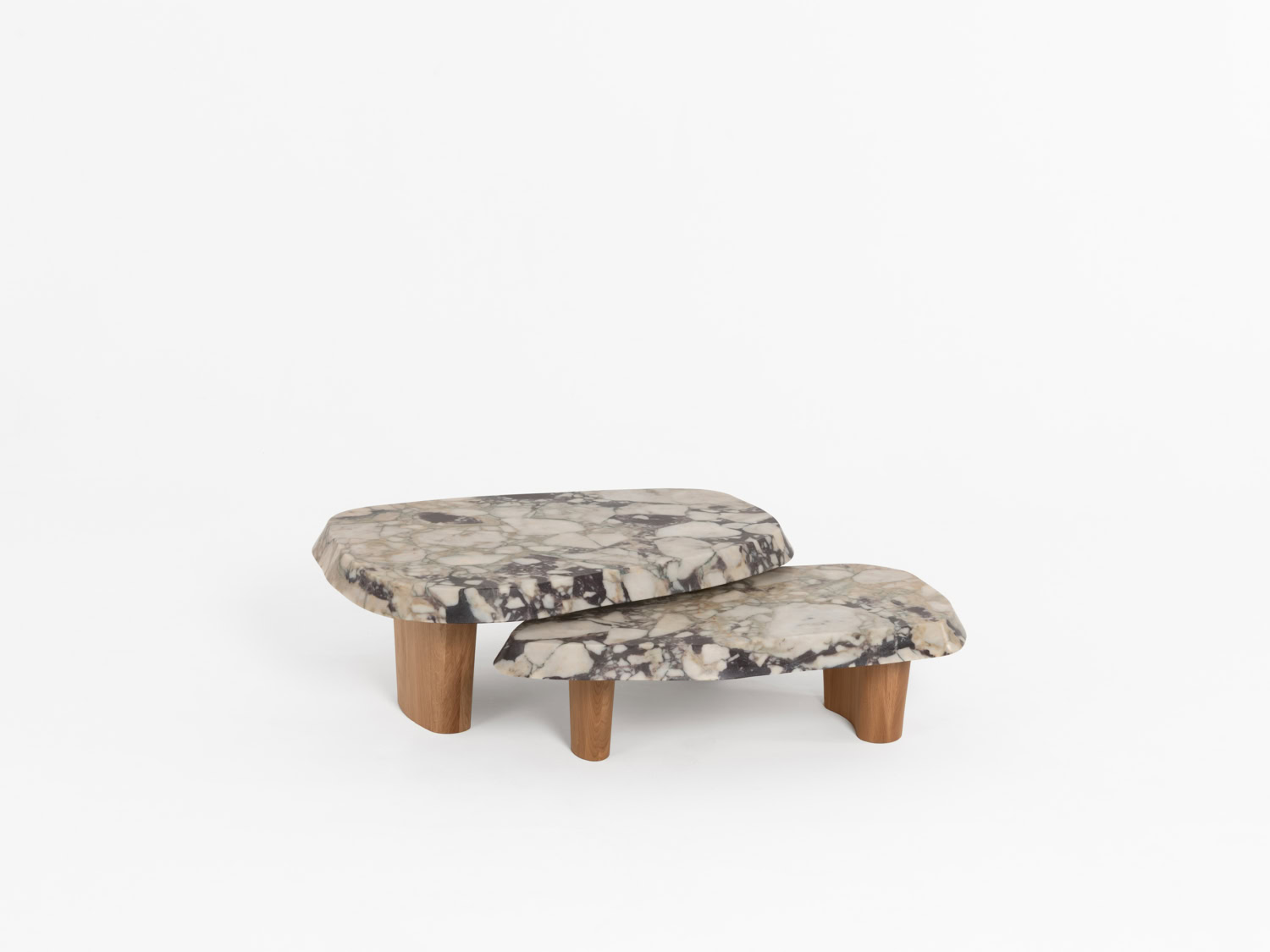 Pair of nesting low tables with organic Calacatta Viola marble tops on cylindrical oak legs — Pierre Augustin Rose Duo Marble