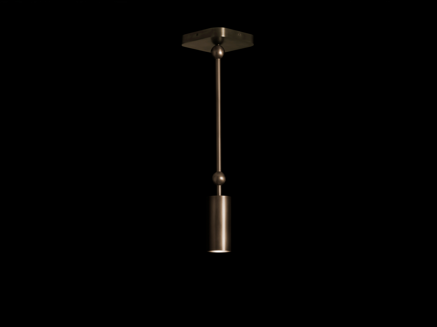 Slender ceiling pendant, brass cylindrical downlight on a thin stem with a spherical joint and square canopy — Apparatus Studio Cylinder Downlight Extended